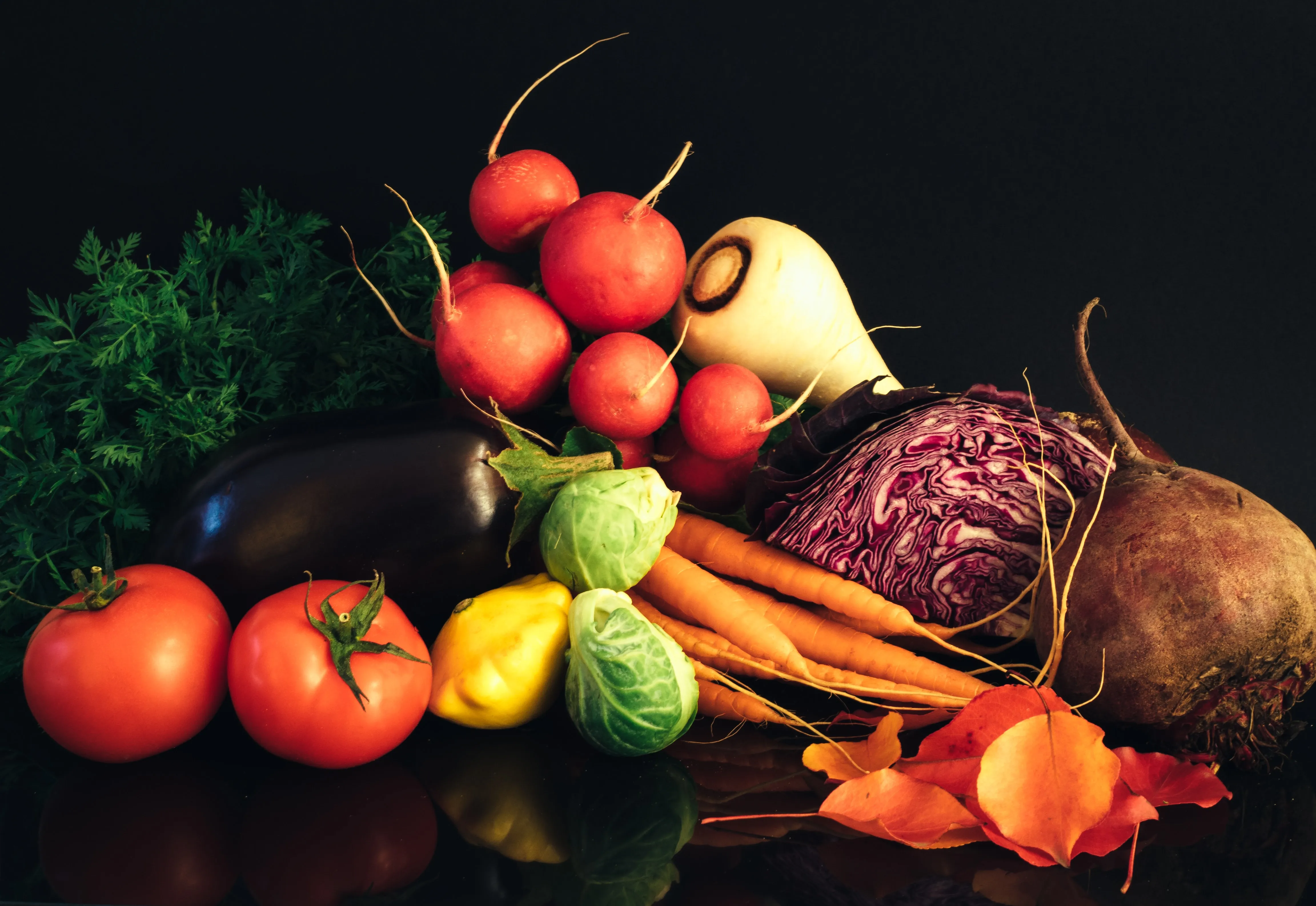 Assorted vegetables on black background